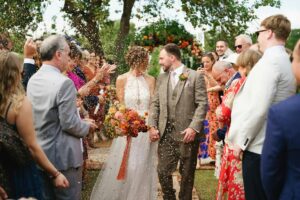pexels-photo-31757195-31757195 Couple celebrates outdoor wedding in England with family and friends.